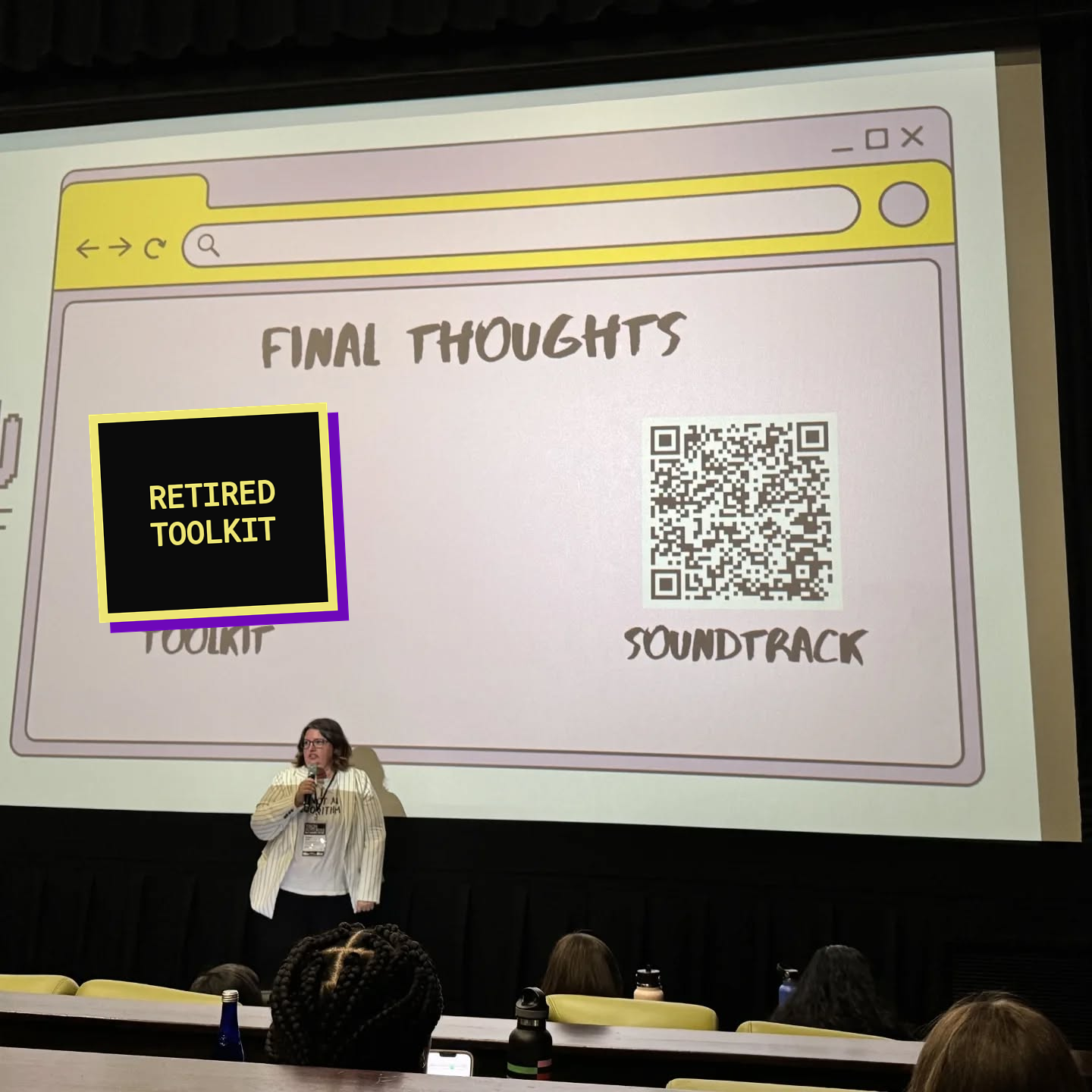 Violet beside the final slide, with the retired toolkit code covered and the public soundtrack code visible
